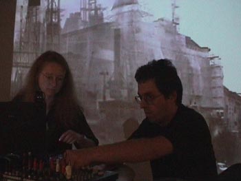 the projection, Andrea Sodomka and Norbert Math in the foreground
